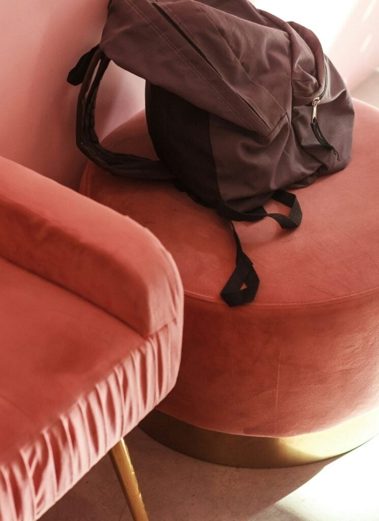Use Poufs or Footrests for Guest Seating