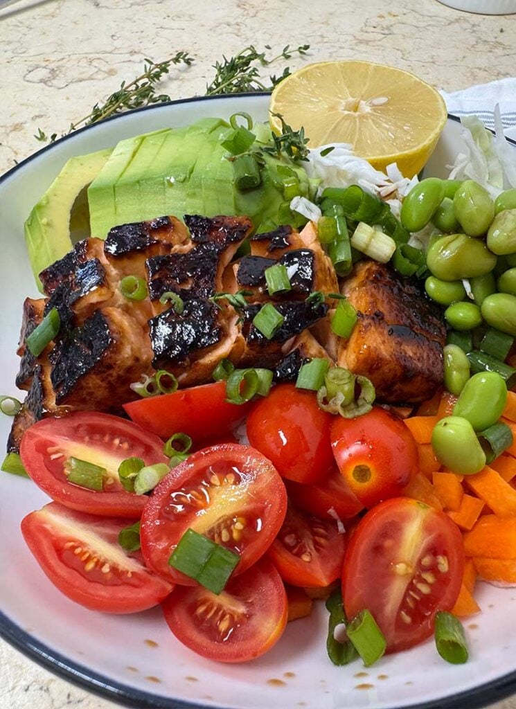 Flaky salmon and glossy teriyaki glaze make every bite of this bowl irresistible.