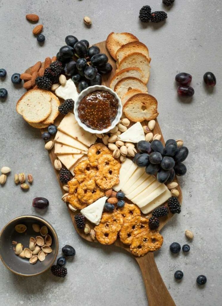 The Coziest Thanksgiving Charcuterie Board Idea Dips and Breads